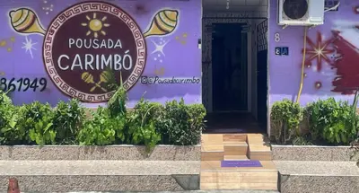 Um certificado, prémio, placa ou documento mostrado em Pousada Carimbó