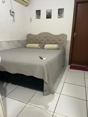 Uma cama ou camas num quarto em Pousada Carimbó