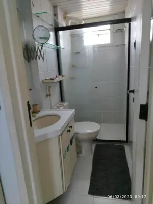 Uma casa de banho em apartamento som do mar