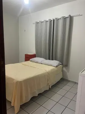 Uma cama ou camas num quarto em Apartamento Icaraí prox ao cumbuco