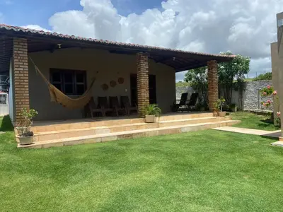 Um jardim no exterior de Casa Paraíso Guajiru