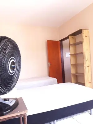 Uma cama ou camas num quarto em Duplex Arretadinho