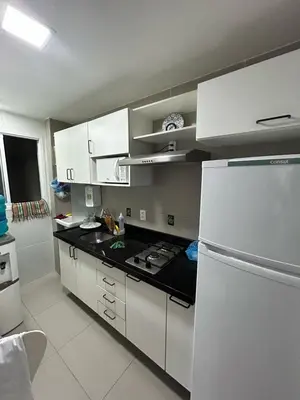 A cozinha ou kitchenette de Apartamento a 50m da Beira Mar