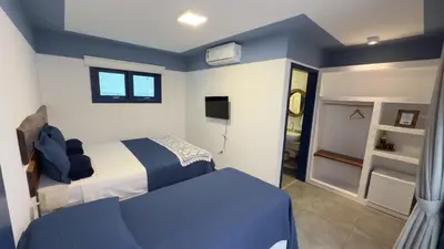 Uma cama ou camas num quarto em Boulevard Pousada Boutique