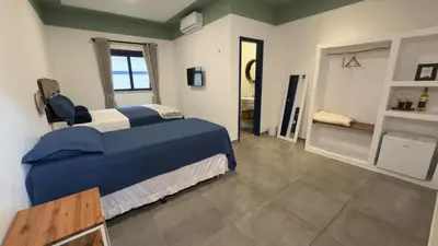 Uma cama ou camas num quarto em Boulevard Pousada Boutique