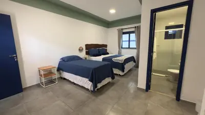Uma cama ou camas num quarto em Boulevard Pousada Boutique