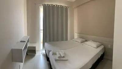 Uma cama ou camas num quarto em Apartment Cumbuco Residence