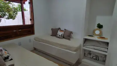 Uma área de estar em Casa Rústica em Condomínio com Piscina