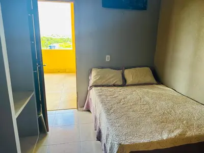 Uma cama ou camas num quarto em Vista Maravilhosa