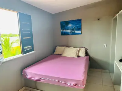 Uma cama ou camas num quarto em Vista Maravilhosa