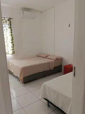 Uma cama ou camas num quarto em Apartamento na Praia do futuro