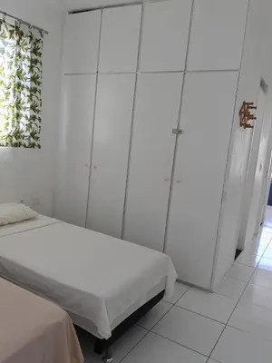 Uma cama ou camas num quarto em Apartamento na Praia do futuro