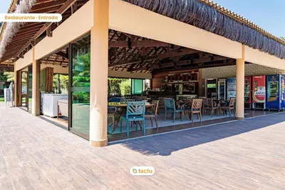 Um restaurante ou outro lugar para comer em Térreo próximo da Piscina e Praia no VG Sun