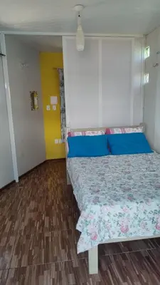 Uma cama ou camas num quarto em Pousada PETIT CHALET Canoa Quebrada