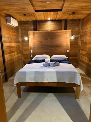 Uma cama ou camas num quarto em Chacara da Sorte