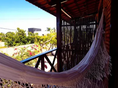 Uma varanda ou terraço em Suítes Bosque de Flecheiras