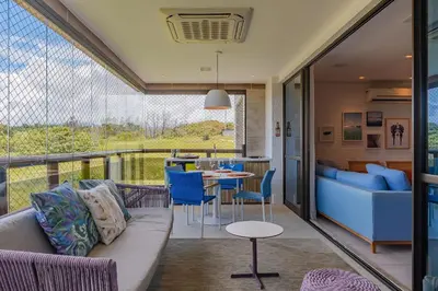 Uma área de estar em WaiWai #406 - Cobertura com Jacuzzi by carpediem