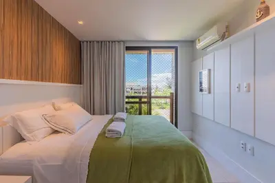 Uma cama ou camas num quarto em WaiWai #406 - Cobertura com Jacuzzi by carpediem