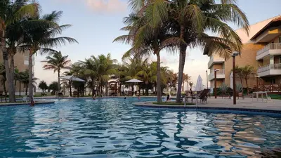 A piscina em ou perto de Apartamento pé na areia com jacuzzi - 3 quartos - 7 hóspedes - Beach Park