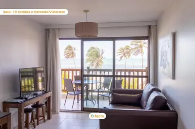 Uma área de estar em Bangalô vista mar VG Sun Cumbuco por Tactu